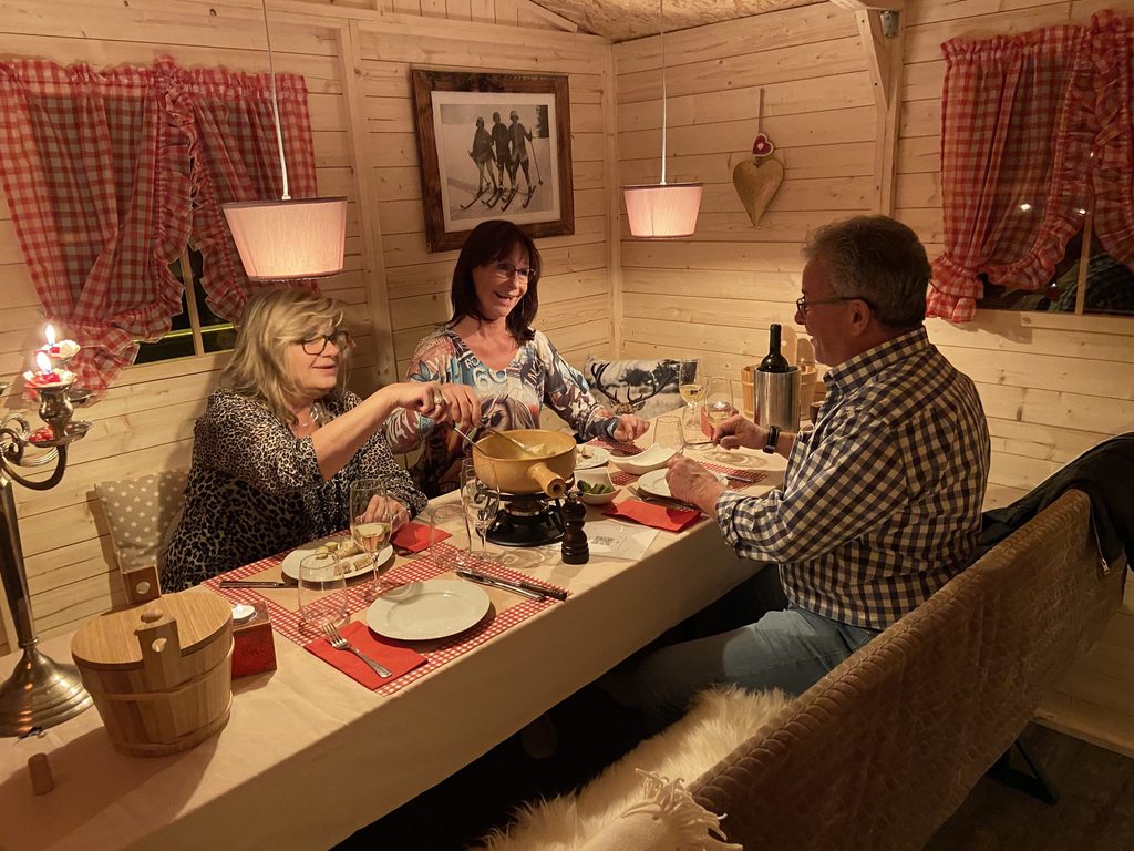 Cozy fondue and raclette at the traditional Raclette Stübli at Restaurant Al Capone in Klosters